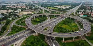 Modern highway interchange with smooth traffic flow, symbolizing efficient infrastructure.